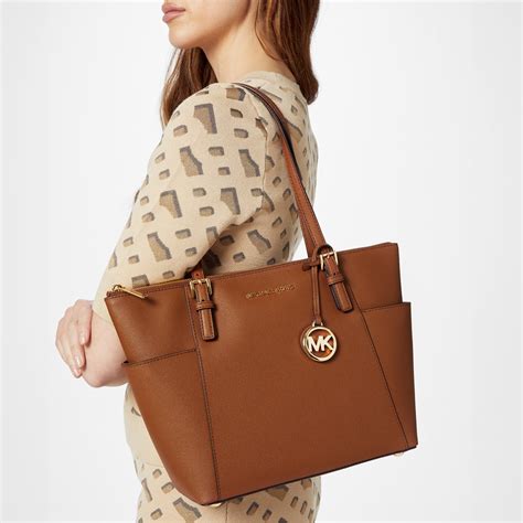 michael kors jet set tote bag 49 59 canada|michael kors airplane print bag.